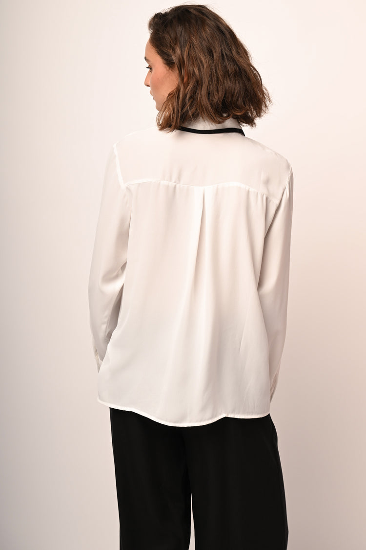 Camicia con fiocco e profili a contrasto