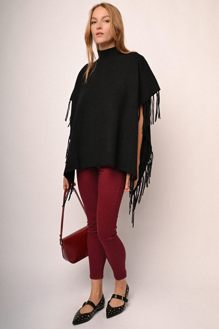 Jeans skinny con bottone gioiello