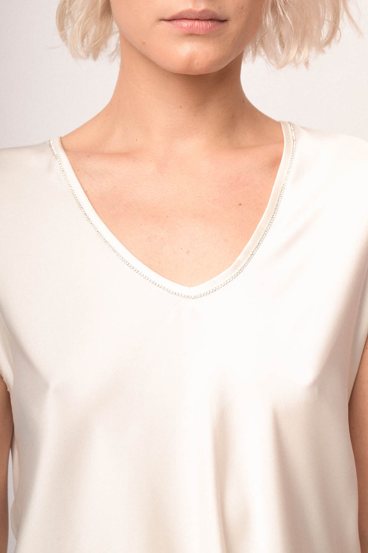 Top scollo V con strass