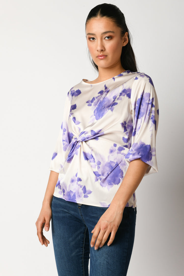 Blusa con nodo e stampa floreale