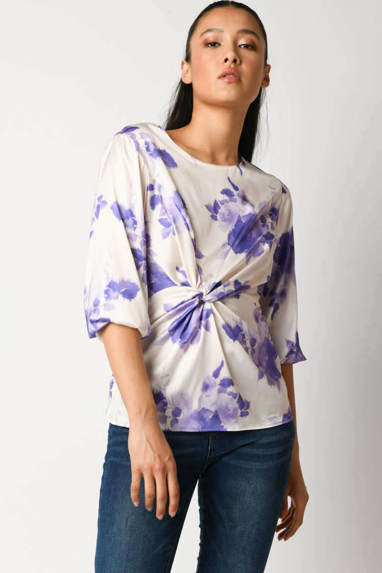 Blusa con nodo e stampa floreale