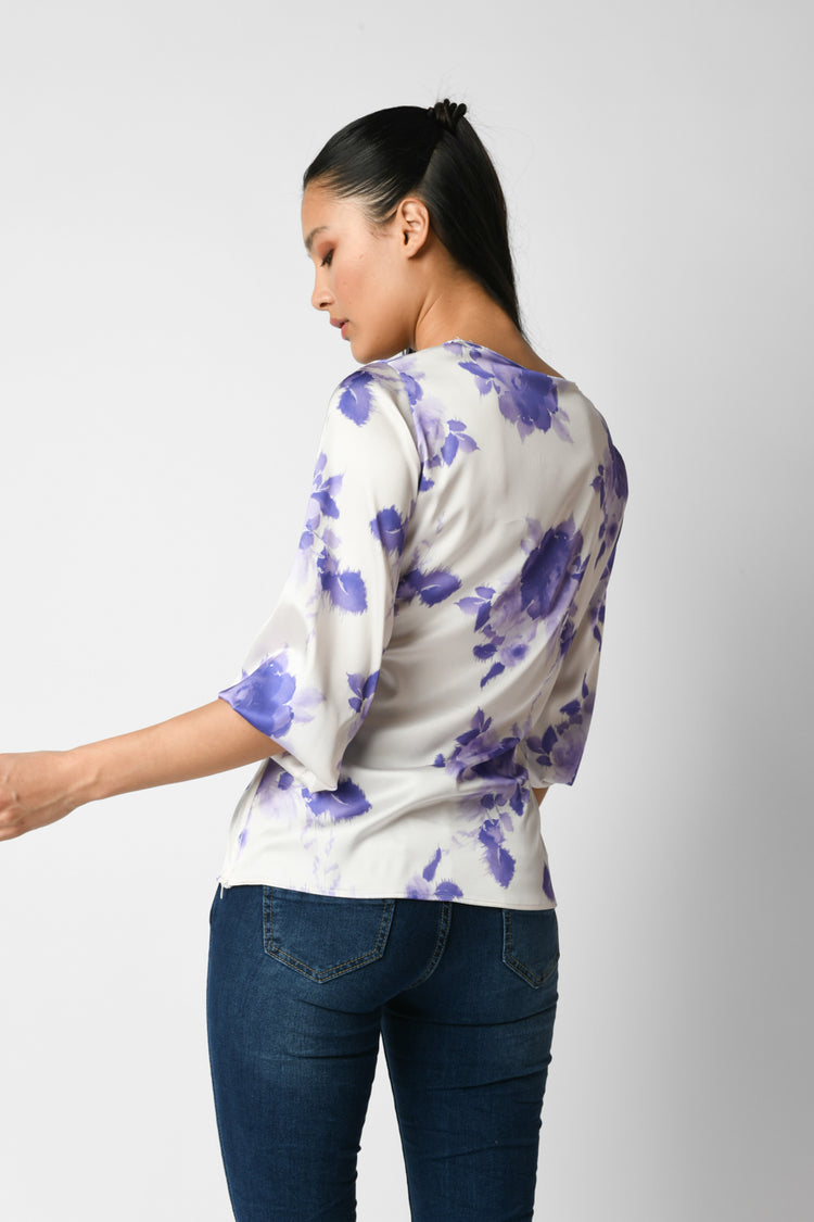 Blusa con nodo e stampa floreale