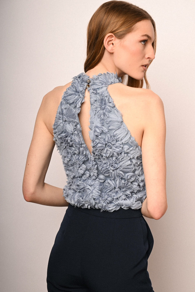 Top con decorazione floreale 3D