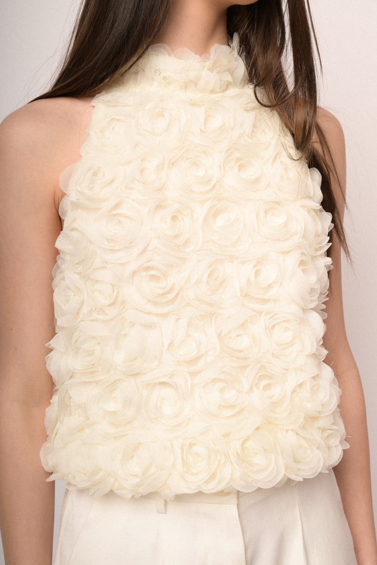Top con decorazione floreale 3D