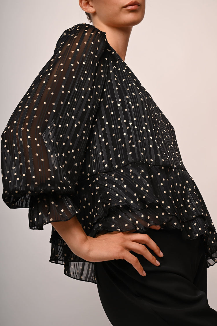 Blusa a pois con volants