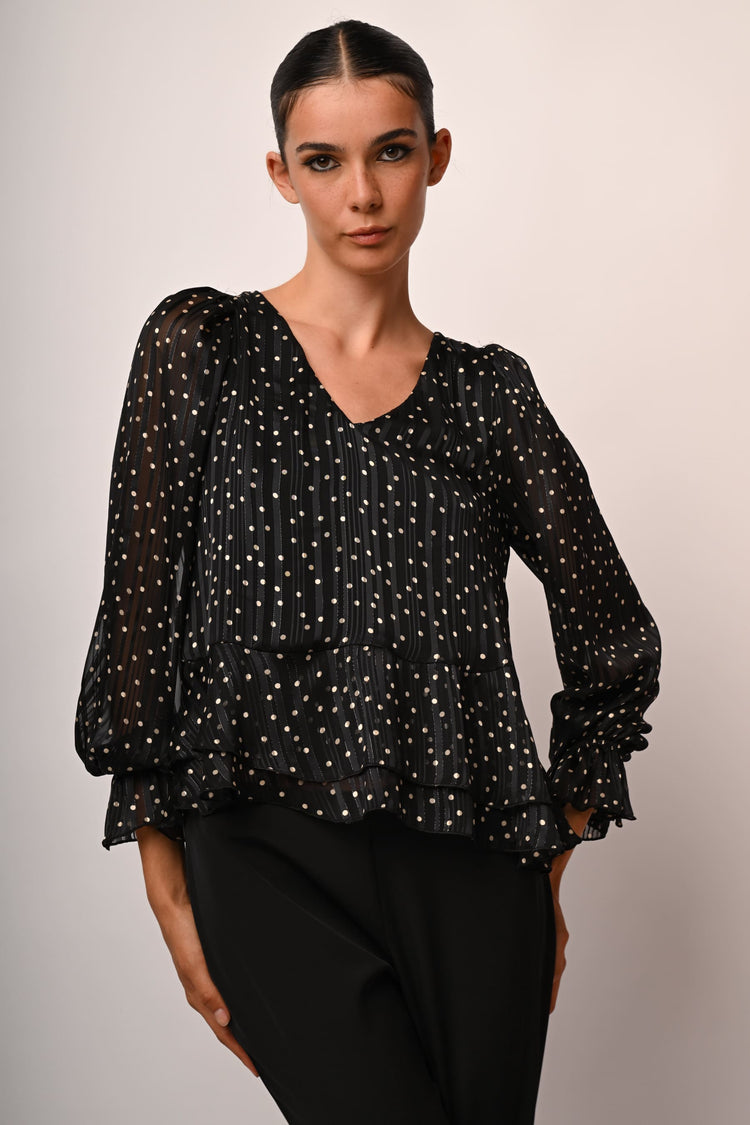 Blusa a pois con volants