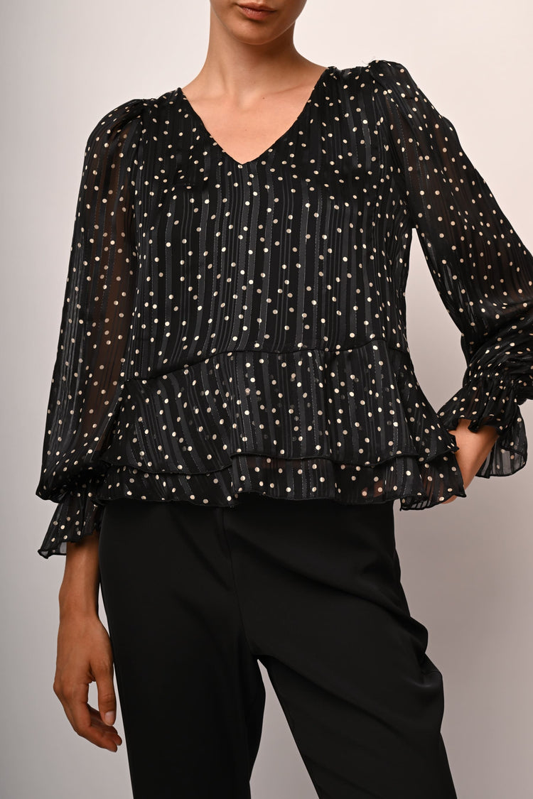 Blusa a pois con volants