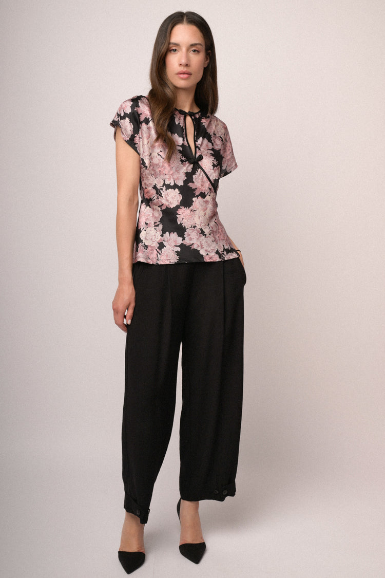 Pantaloni baggy con bottoni
