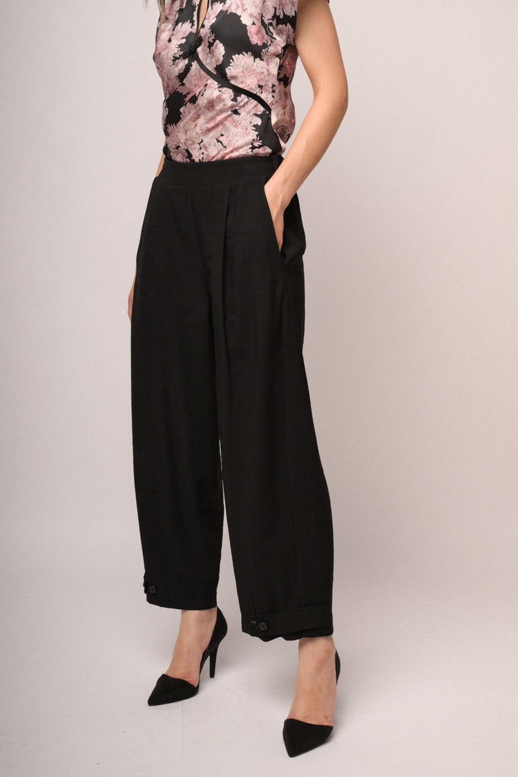 Pantaloni baggy con bottoni