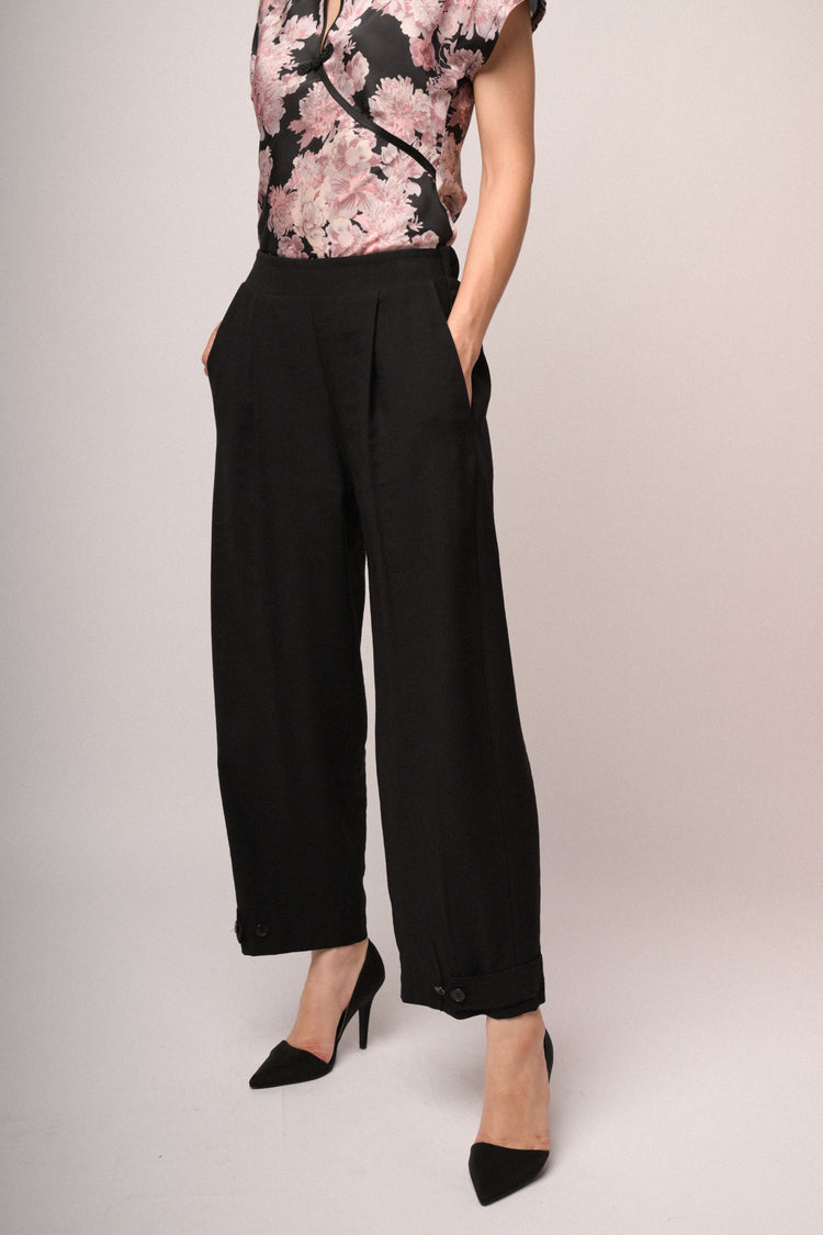 Pantaloni baggy con bottoni