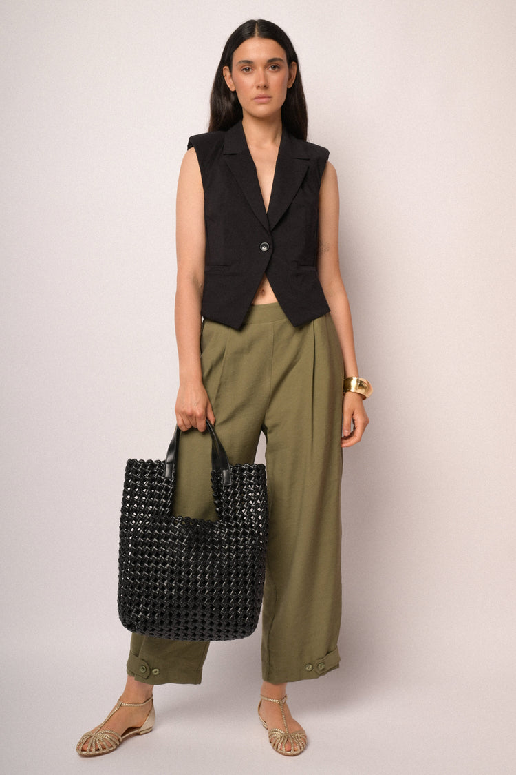 Pantaloni cropped verde militare con bottoni al fondo