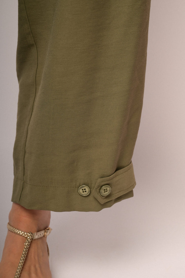 Pantaloni cropped verde militare con bottoni al fondo