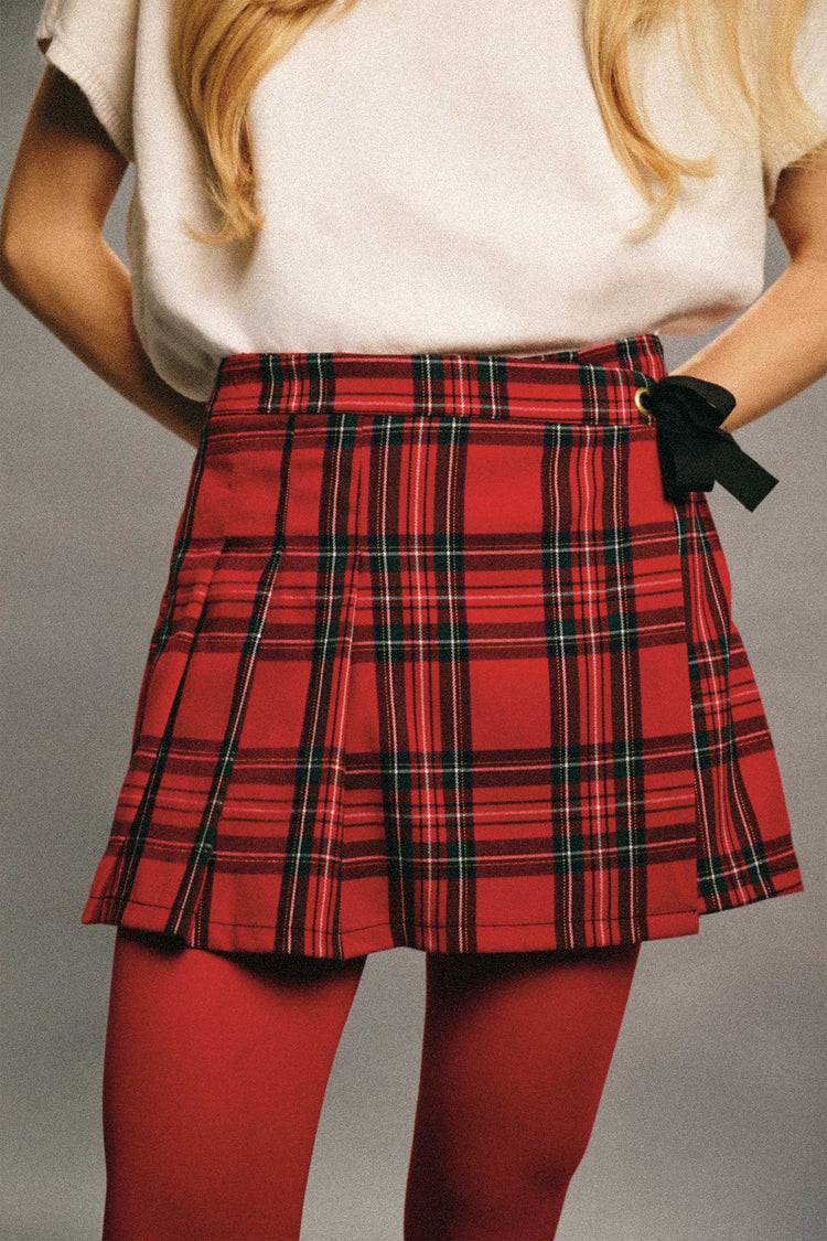 Skort con motivo scozzese e fiocco