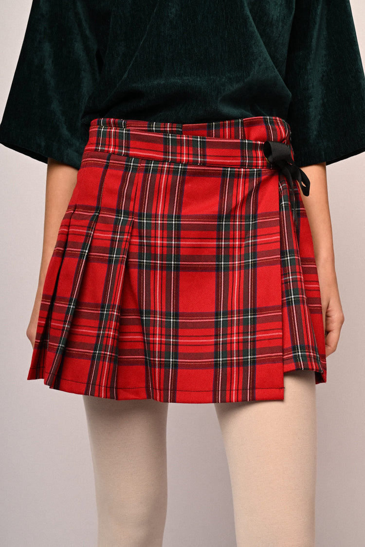Skort con motivo scozzese e fiocco