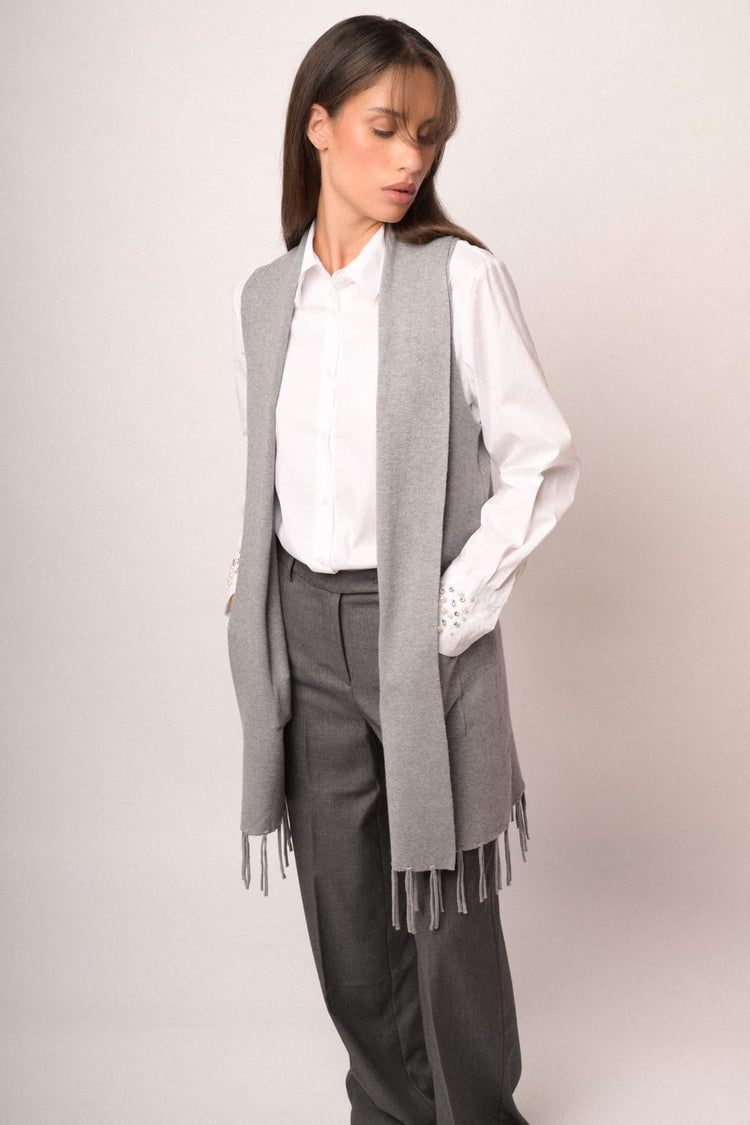 Gilet lungo con frange