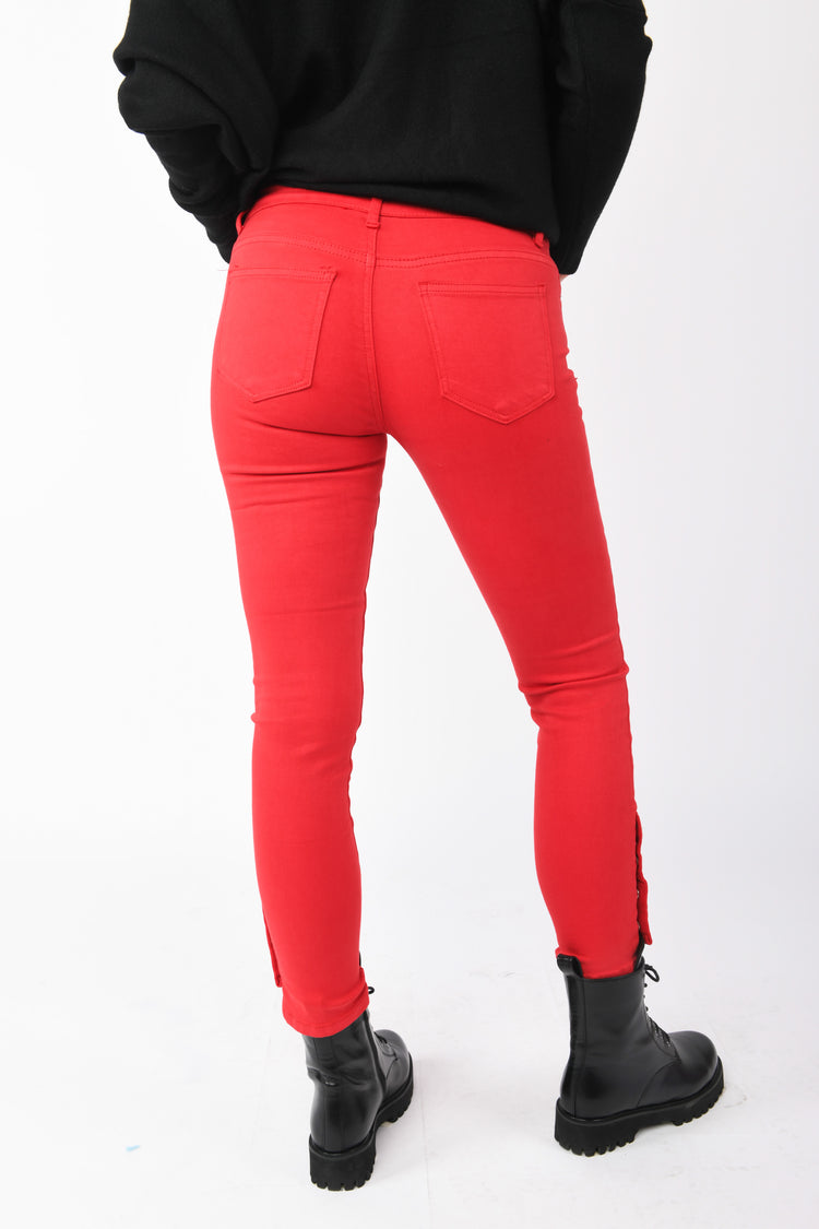 Pantaloni skinny con bottoni