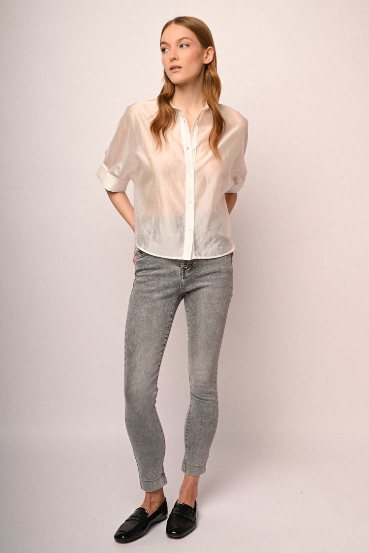Jeans skinny in denim grigio con decorazione strass