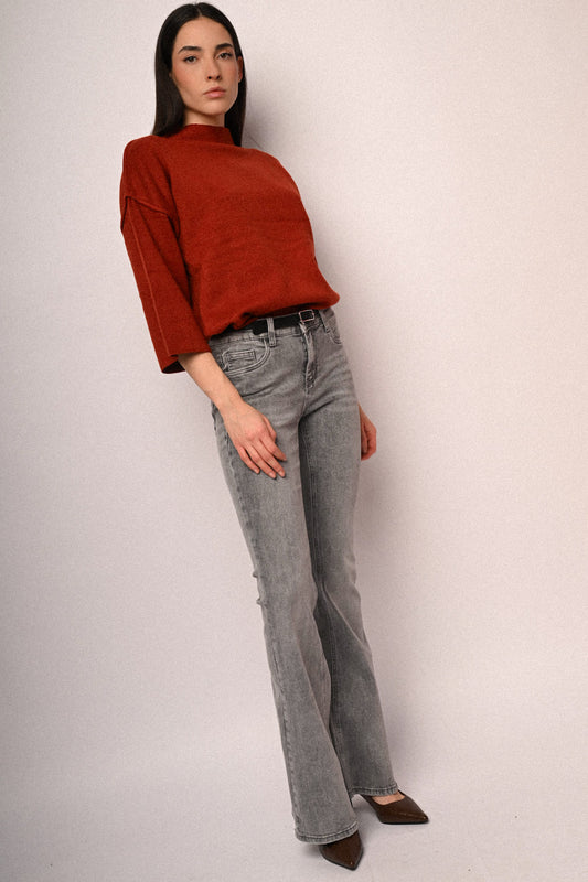 Jeans svasati con glitter e cintura