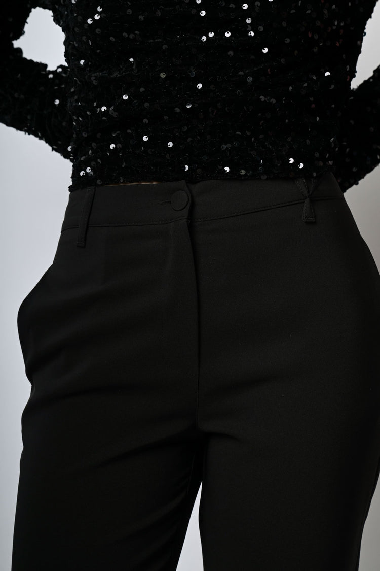 Pantaloni a sigaretta con piega stirata