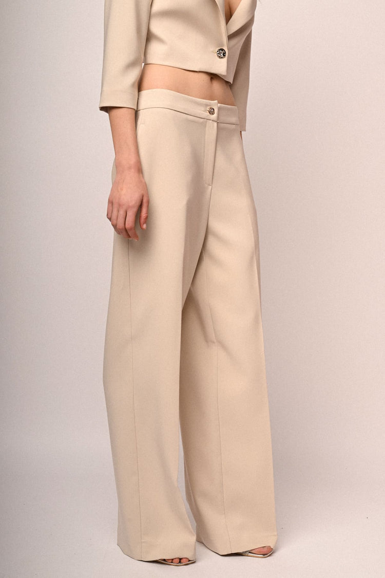 Pantaloni palazzo con bottone gioiello