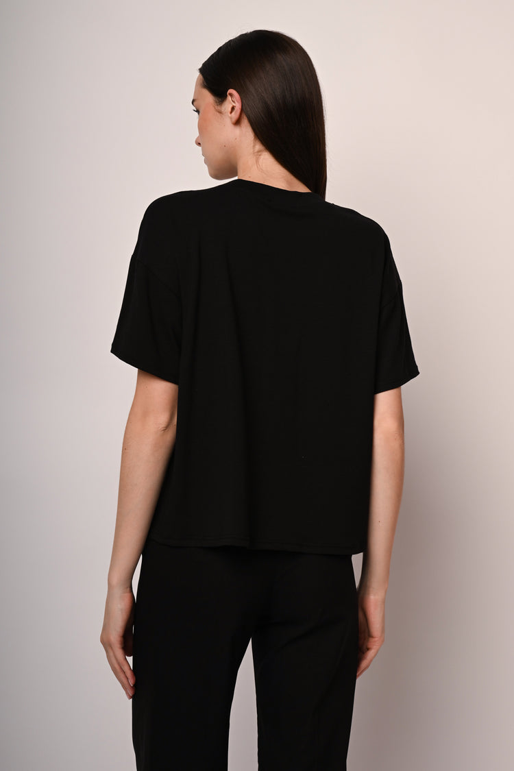 T-shirt con applicazione floreale