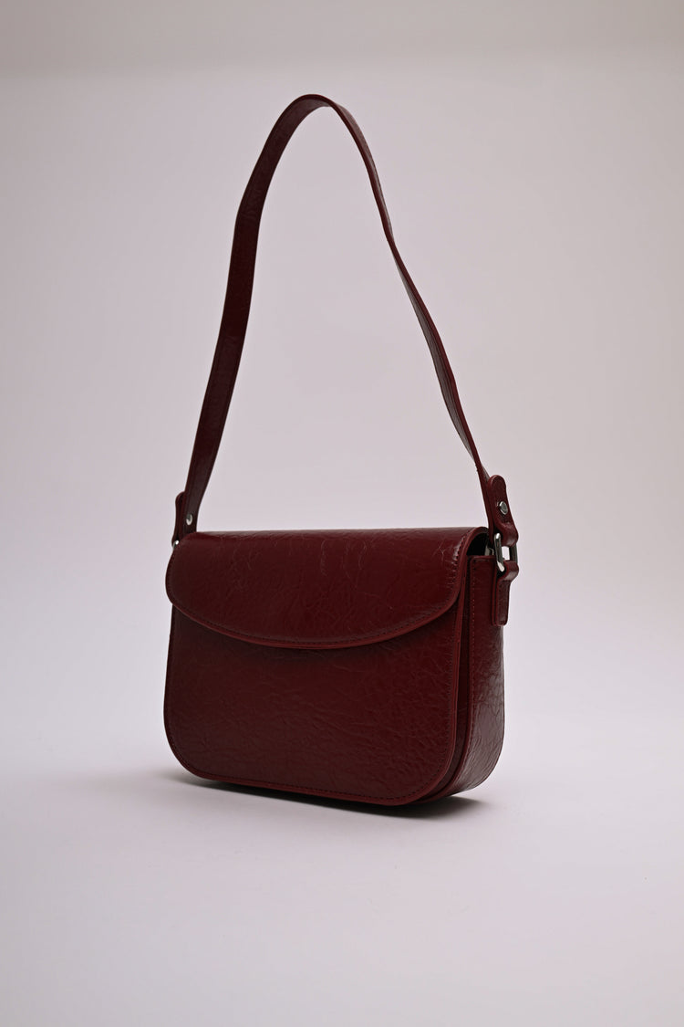Borsa a spalla in similpelle martellata