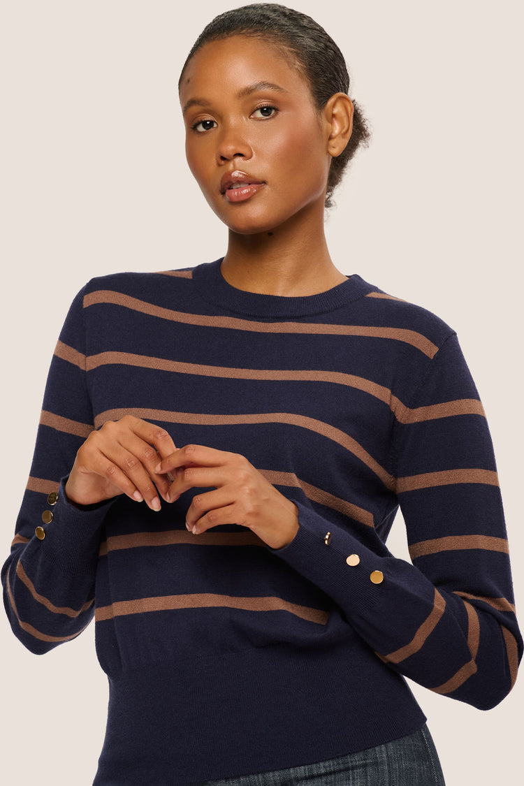 Pull a righe con bottoni ai polsini