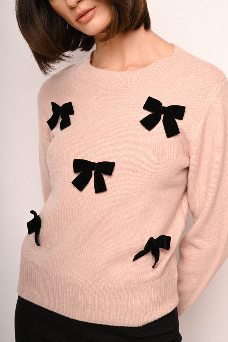 Pull con decorazione fiocchi