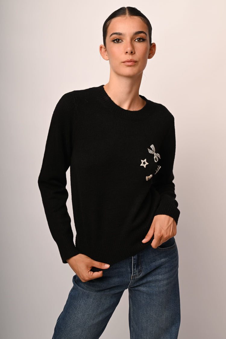 Pull con spille gioiello