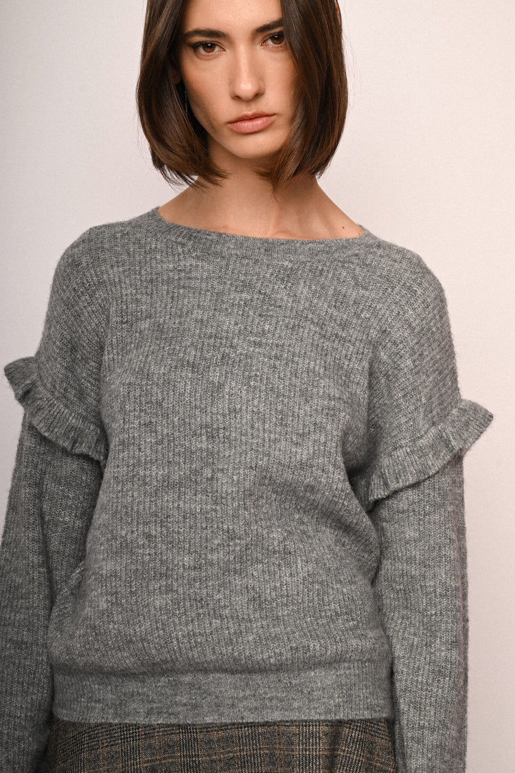 Pull con volants alle maniche