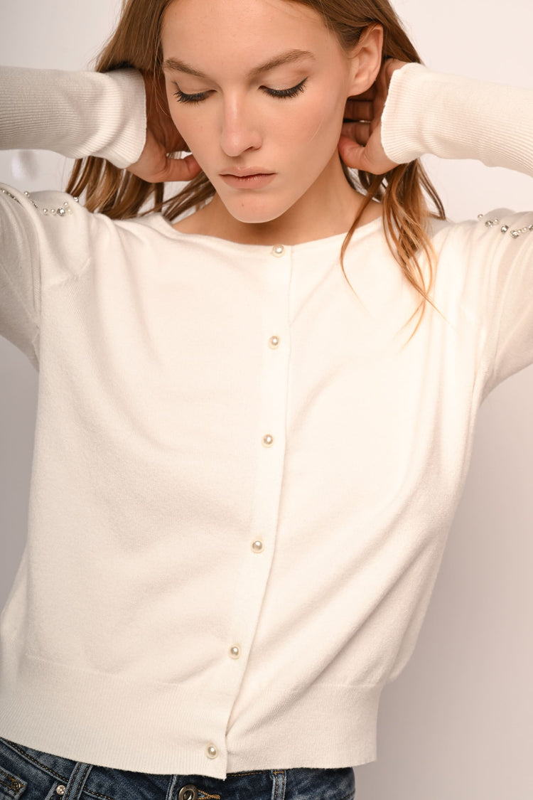 Cardigan con perle e strass decorativi