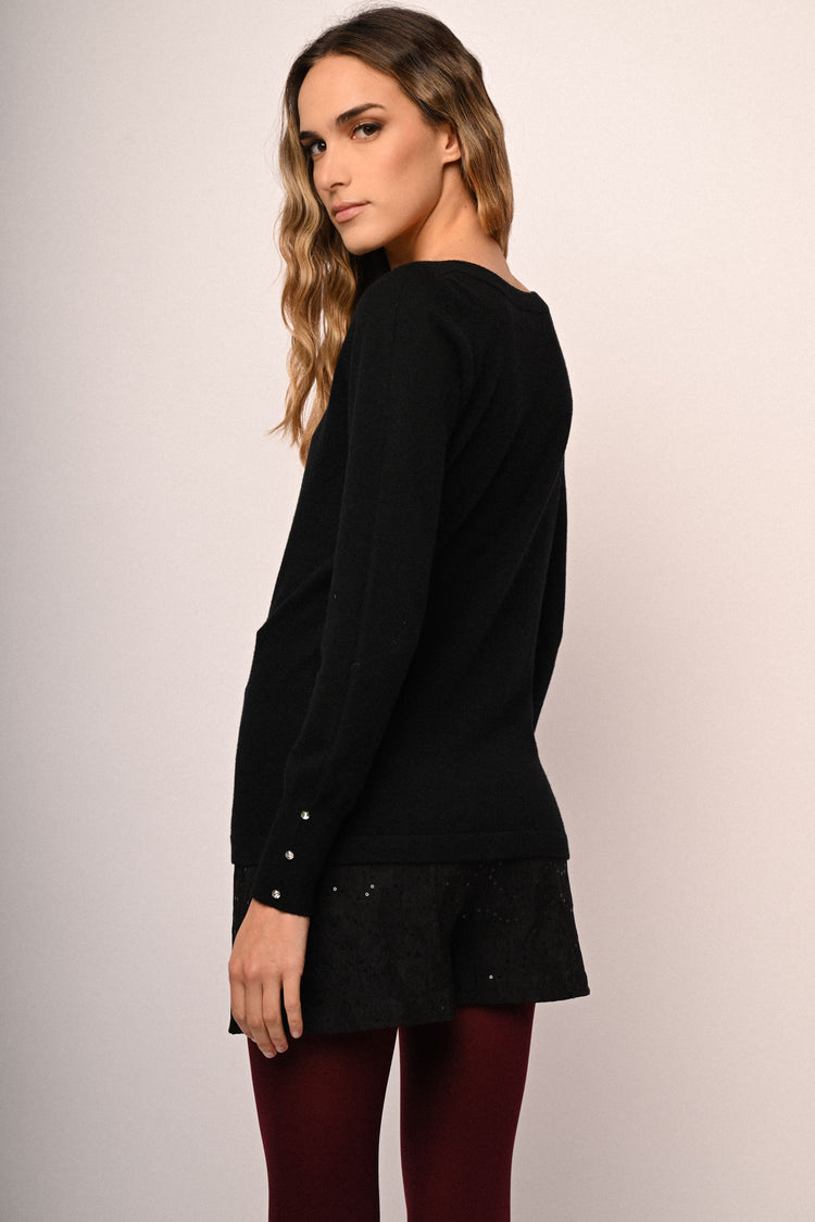 Pull con strass ai polsini