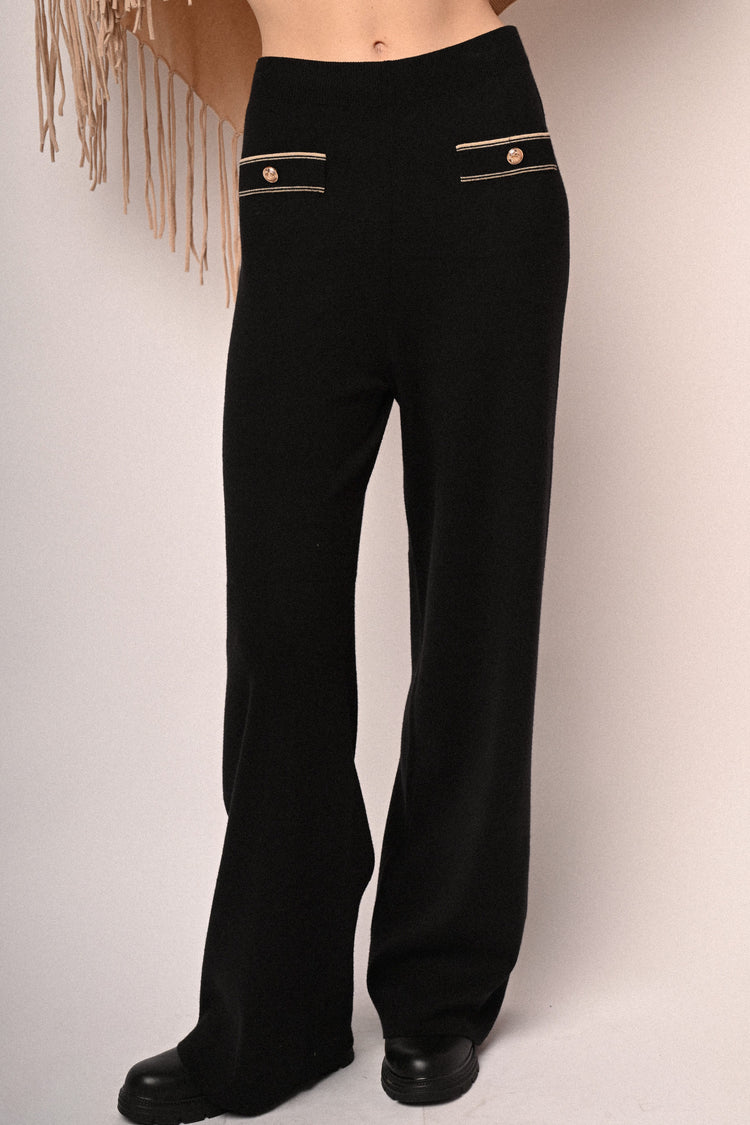 Pantaloni in maglia con bottoni e profili lurex