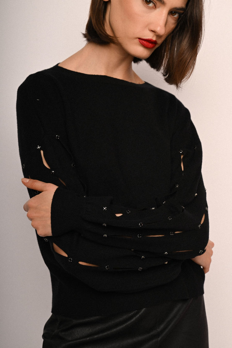 Pull con cut-outs e strass sulla maniche