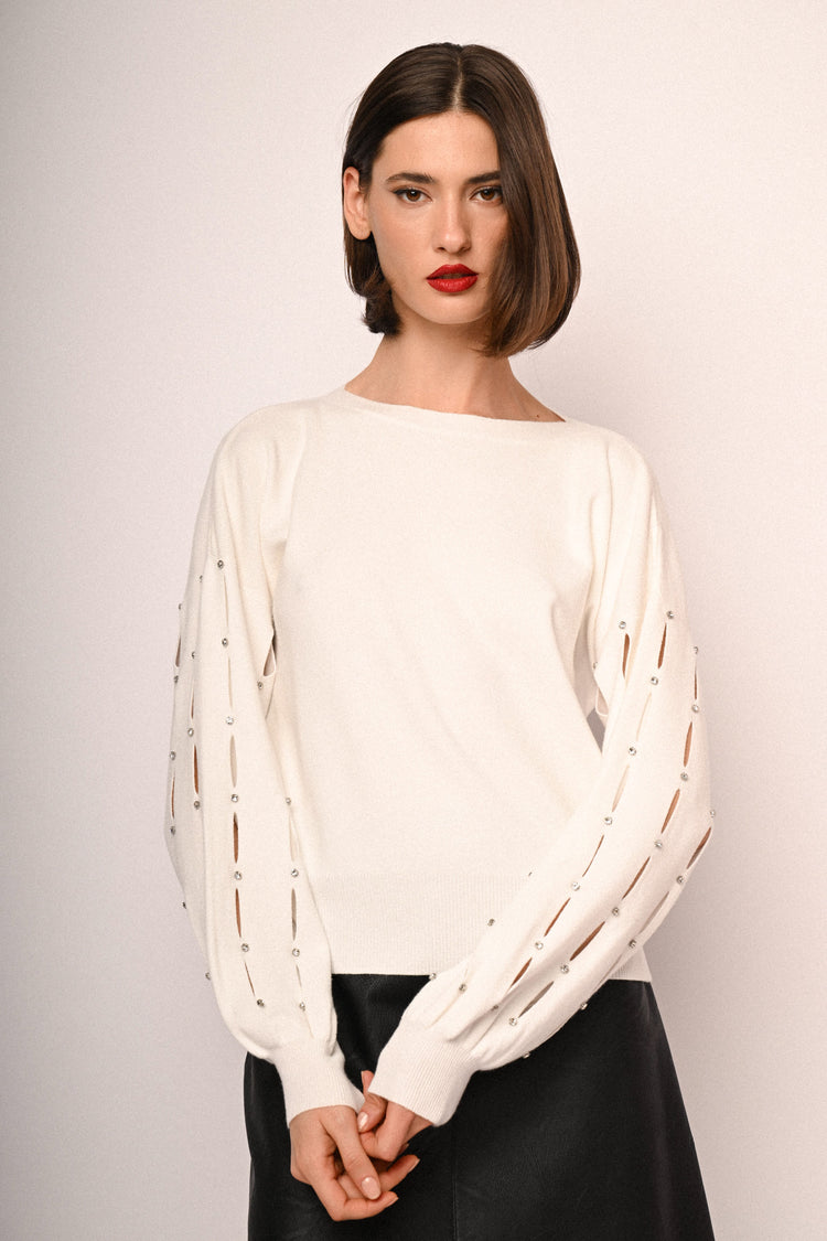 Pull con cut-outs e strass sulla maniche