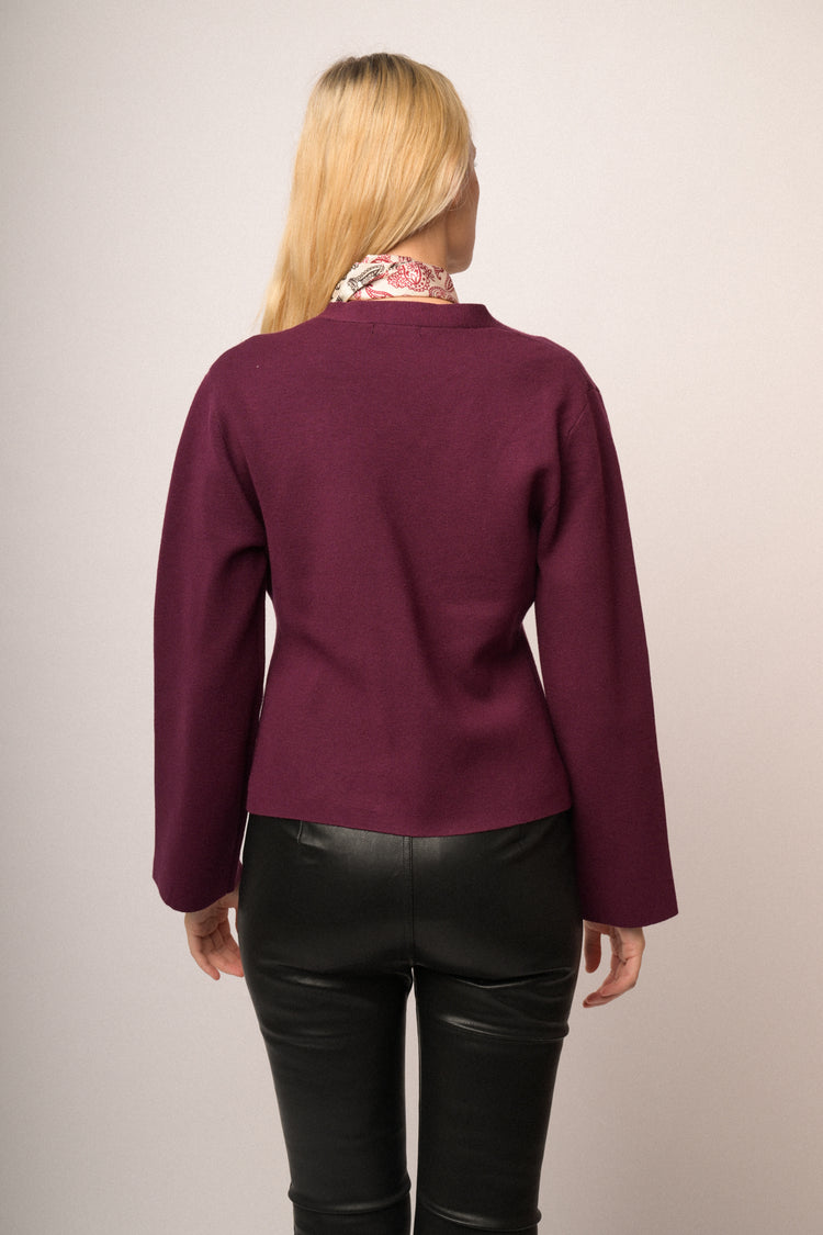Cardigan incrocio con bottone