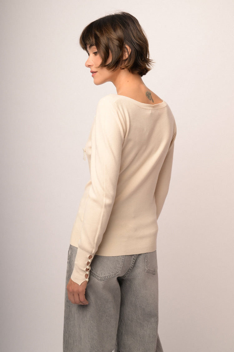 Maglia shiffer con fiocchi perline