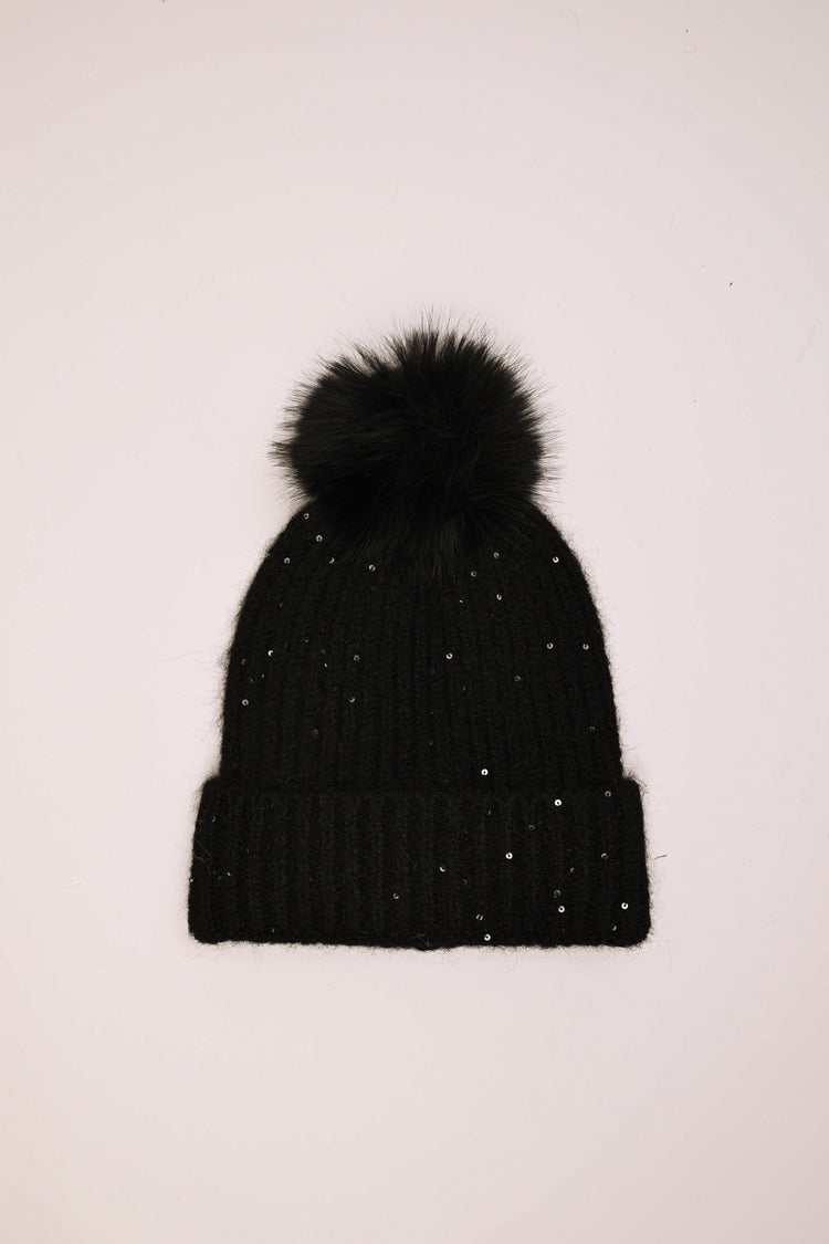 Berretto con pompon e paillettes