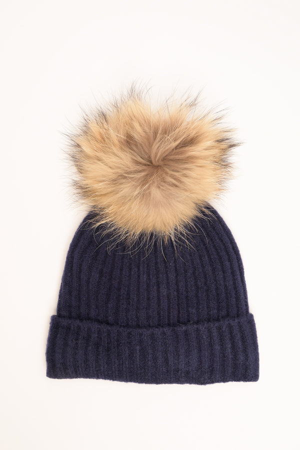 Cappello a coste con pon pon blu