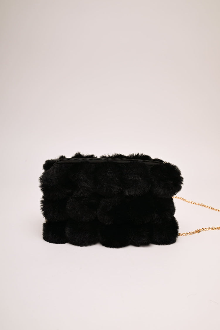 Borsa con pompon in faux fur