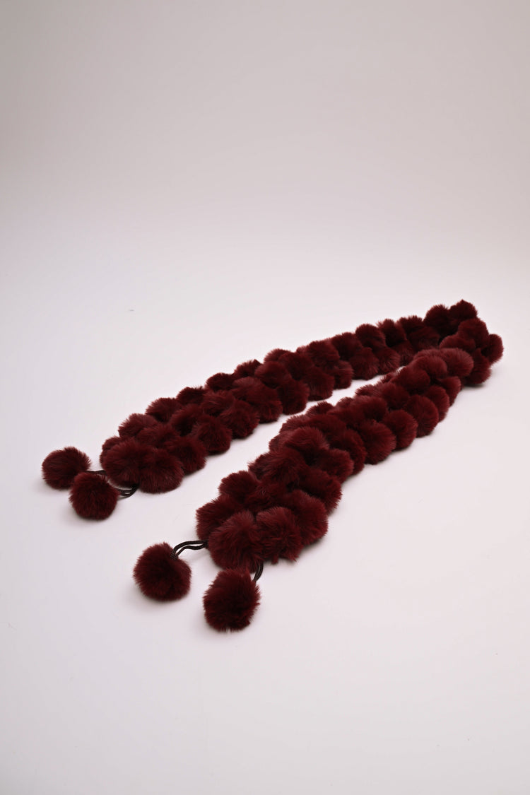 Collo con pompon in faux fur