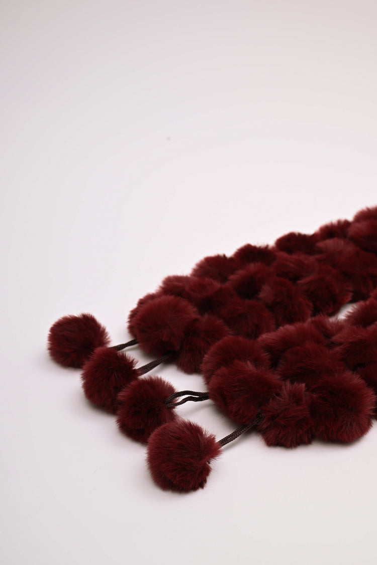 Collo con pompon in faux fur