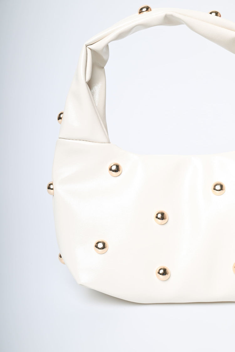 Borsa piccola a mezzaluna con borchie