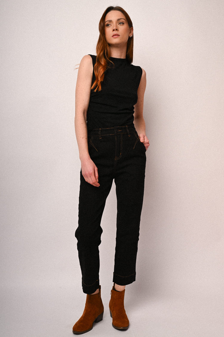 Jeans con impunture a contrasto