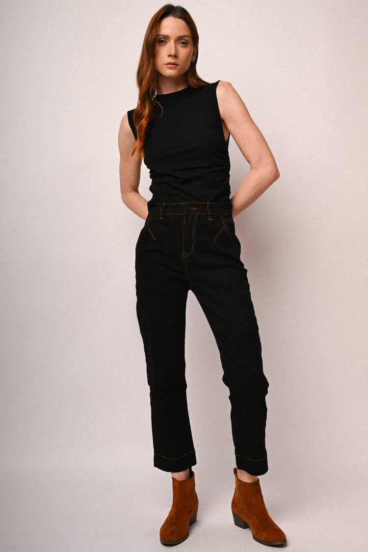 Jeans con impunture a contrasto