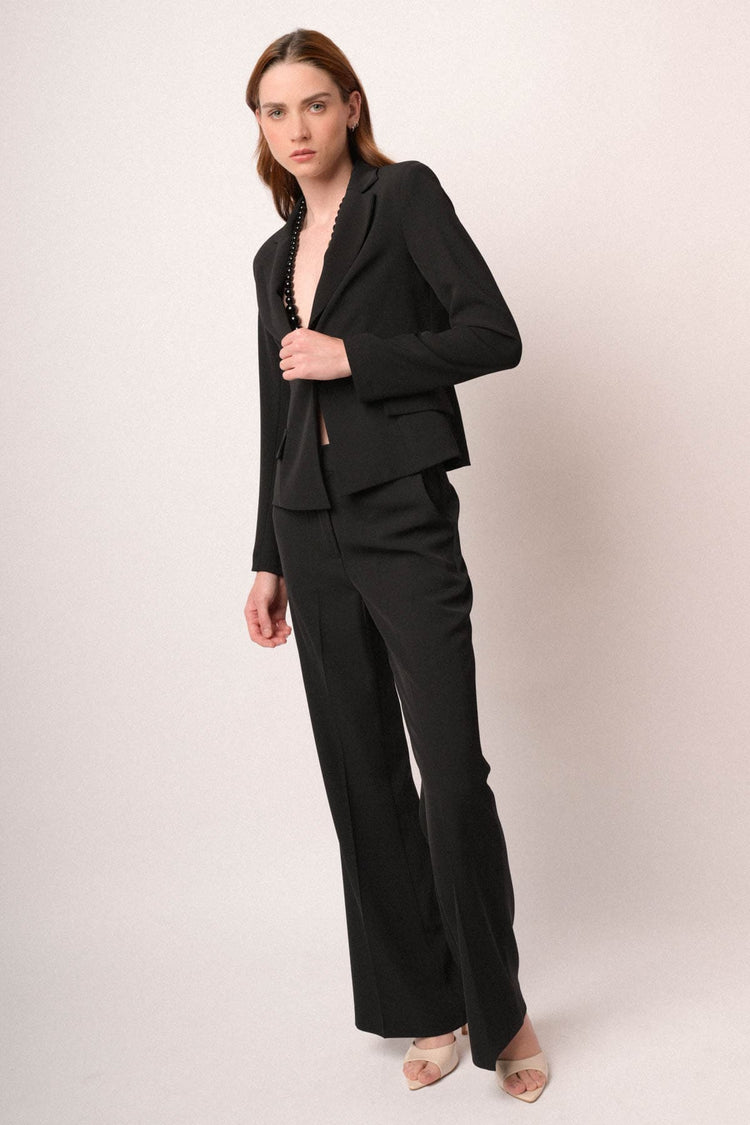 Pantaloni zampa gessato