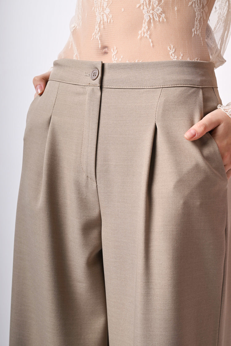 Pantaloni palazzo con tasche sul retro